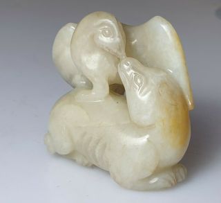 A Fine Qing Dynasty Creamy White Jade Carving Of A Qilin & Eagle.