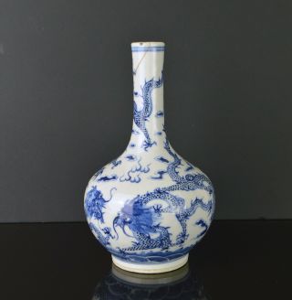 A 19th Century Chinese Porcelain Blue & White Vase With 3 Dragons