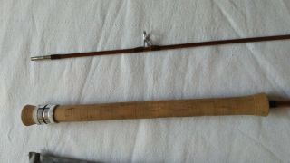 Orvis Impregnated ultralite spinning rod.  6 ' split bamboo. 5