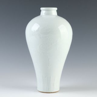 Antique Chinese White Glaze Carved Dragon Porcelain Vase