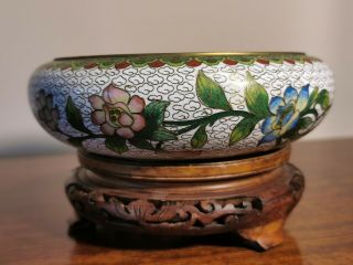 A Chinese Cloisonne Bowl With Flowers And Birds On A Wooden Stand