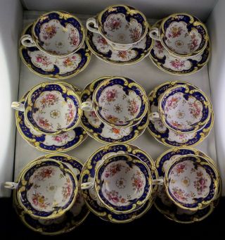 Nine Cobalt Floral & Heavy Gold Antique Soft Paste Tea Cups With Plates