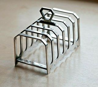 An Antique Mappin & Webb Art Deco Silver Plated 6 Serving Toast Rack