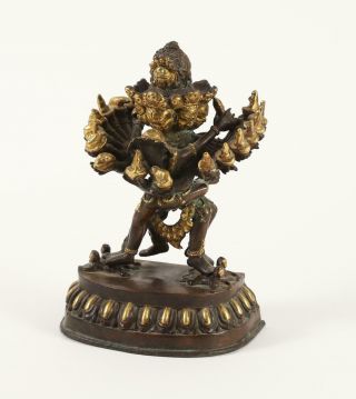 Tibetan Parcel Gilt Bronze Figure Of A Multi Armed Deity 19th Century