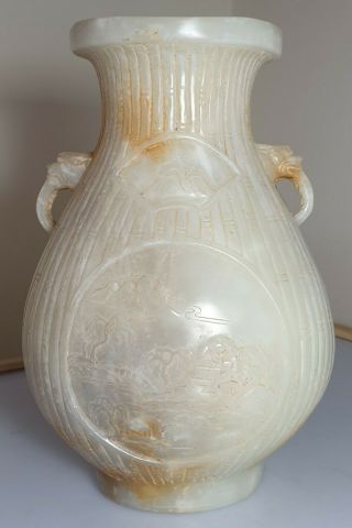 A Fine Qing Dynasty Cream/ White Jade Carved Vase.
