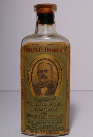 Near Full Old Vintage 1900s Dr.  Ac Daniels Graphic Paper Label Medicine Bottle