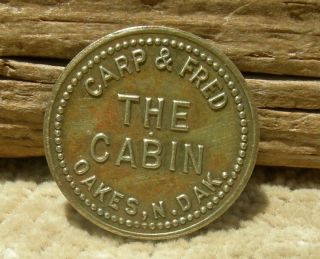 Antique Oakes,  North Dakota Nd (dickey Co Nr Sd) " The Cabin (bar) " Brass Token
