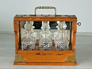 Antique English Oak Tantalus Liquor Cabinet 3 Crystal Decanter Set -