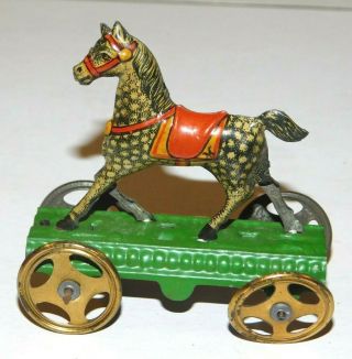 Antique Penny Toy Style Miniature Rolling Horse Tin Pull Toy