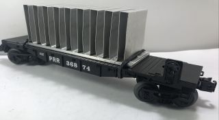 C - 5,  Lionel O Gauge Black Flatcar Prr 36874 With One Of A Kind Aluminum Load