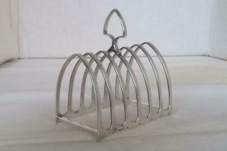 A Large & Heavy Solid Silver Gothic Arch 7 Bar Toast Rack Dates 1936 154.  7 Grams