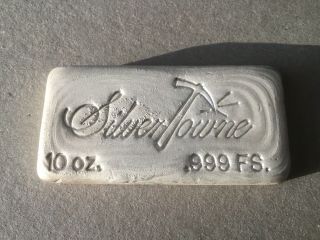 Silvertowne Poured.  999 Silver 10 Oz Bar