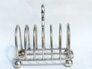 Solid Silver Toast Rack,  1922 By Goldsmiths & Silversmiths Co.  208gms
