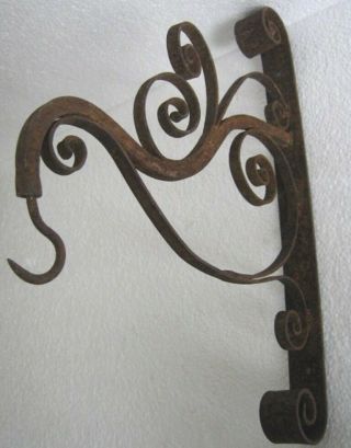 Vintage Wrought Iron Wall Bracket With Hook.