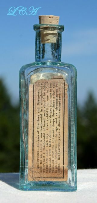 Antique Opium Balsam Bottle Embossed And Labeled Old Turquoise Color Small Size