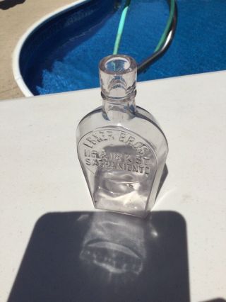 Antique EBNER BROS whiskey flask.  116&118 K st.  Sacramento CA 3