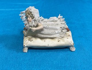 Vintage German Dresden Lace Porcelain Figurine Child Laying Down Reading
