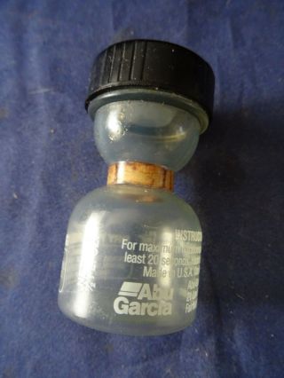 A Scarce Vintage Abu Garcia Dry Fly Dressing Bottle