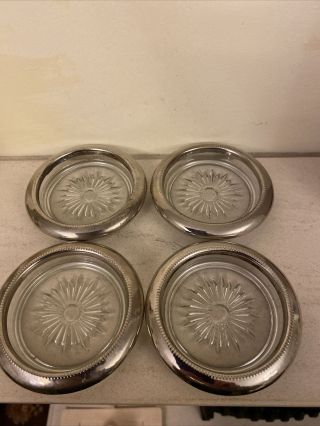 Vintage 4 Starburst Glass & Silver Plated Coasters And 1 Silver Napkin Ring.
