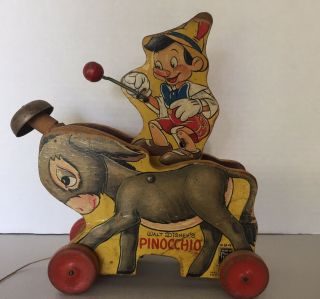 Vintage Antique Fisher Price Disney Plinky Pinocchio Wood Pull Toy 494