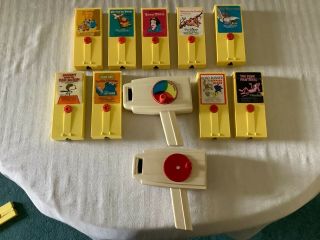 Two Vintage Fisher Price Movie Viewer With 9 Cartridges Disney Snoopy