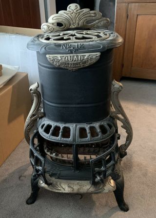 Quad Stove Co.  No.  12 Antique Cast Iron Natural Gas Parlor Stove