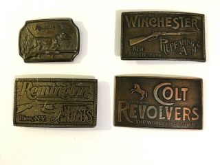 Remington,  Colt And Winchester Vintage Belt Buckles (4)