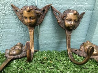 Quartet Of Early 19thc Bronze Hooks With Winged Angel Heads C1820s