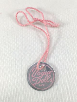 " Vogue Dolls,  Inc.  " Round Hang Tag With Pink String