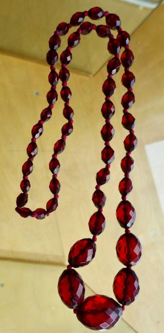 LOVELY,  LONG ANTIQUE,  FACETED CHERRY AMBER BAKELITE GRADUATED,  BEAD NECKLACE 47g 3