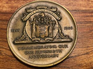T2: 1855 - 1955 100th Anniversary Medallic Art Bronze Fireman 