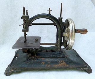 C.  1890 Cast Iron Hand Crank German Sewing Machine,  Nickel Plated Wheel