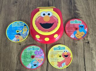 2007 Sesame Street Elmo Toy Cd Music Player With 4 Discs.
