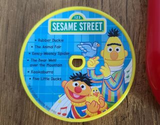 2007 Sesame Street Elmo Toy CD Music Player With 4 Discs. 2