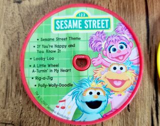 2007 Sesame Street Elmo Toy CD Music Player With 4 Discs. 3