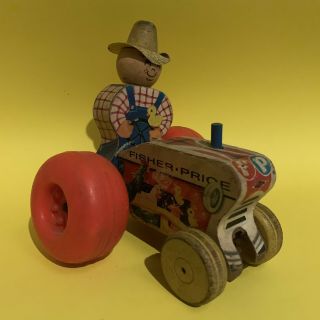 Vintage Fisher Price Farmer On Tractor Pull Toy