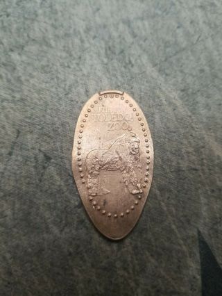 (b104) The Toledo Zoo,  Copper Elongated Penny Pressed