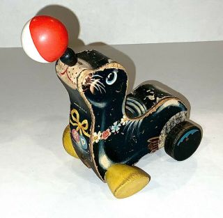 vintage FISHER PRICE black SUZIE SEAL w/ balancing ball TOY wooden pull toy 2
