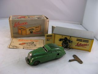 Schuco Tinplate Toy Car And Garage.