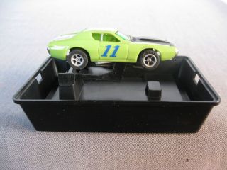 Vintage Aurora AFX lime green Dodge Charger 1773 slot car with stand 2