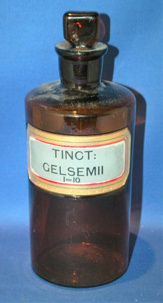 An 8.  5 " Antique Amber Glass Apothecary Bottle,  Tinct.  Gelsemii,  York Glass Comp