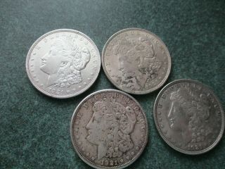 4 1921 Morgan Silver Dollars.  1 " D ",  " S ",  & 2 " P " S