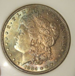 1884 Morgan Silver Dollar - Bu,  Rainbow Tones,  Fully Toned Both Sides,  3902
