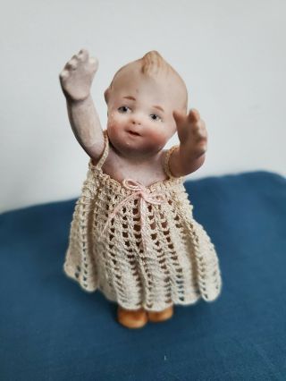 Vintage/antique All Bisque Miniature Reaching Baby Doll 4 " Cute