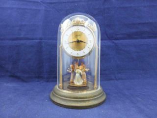 Vintage Schmidt German Made Dome Clock With Revolving Angels In Order.