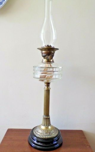 A Victorian Cut Glass Font Oil Lamp On A Brass Column Black Base Order