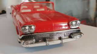 Vintage AMT 1958 Pontiac Bonneville Convertible Dealer Promo Model Car in Red. 3