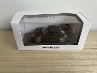 Minichamps 1/43 Scale Porsche 911 Gt3 Rs In Black With Gold Wheels