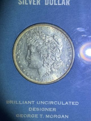 1881 S Morgan Silver Dollar Brilliant Uncirculated.  Encased In Us Container