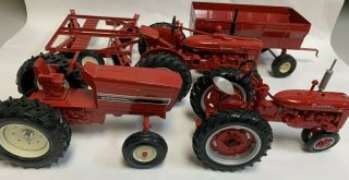 Mccormick Farmall & International Toy Tractors With Wagon And Disk Plow Set